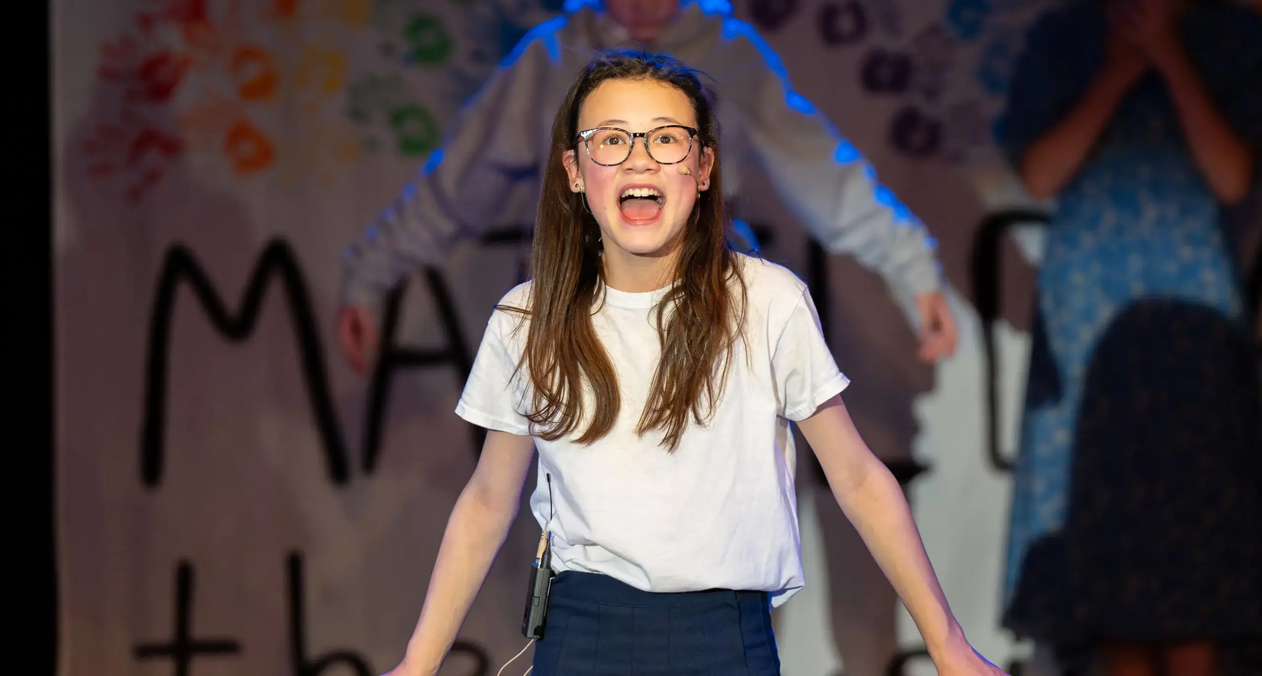 Pupil at Embley School, a private school in Hampshire, performing on stage